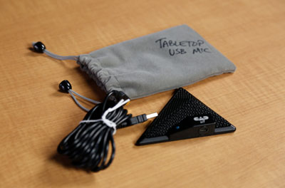 Microphone comes in a grey pouch. Included is the microphone and a long USB cord.