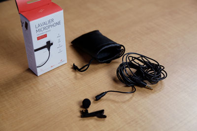Comes in the original box in a black pouch and has a mic clip and wind screen